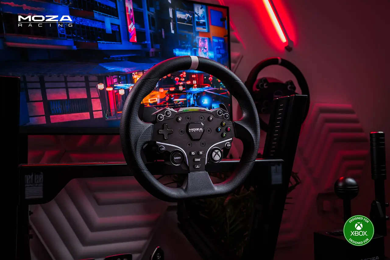 MOZA Racing R3 Racing Wheel Mounted To A Desk